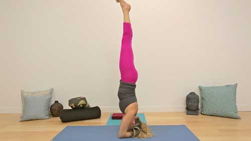 Headstand pose calms the mind and improves blood circulation to the brain